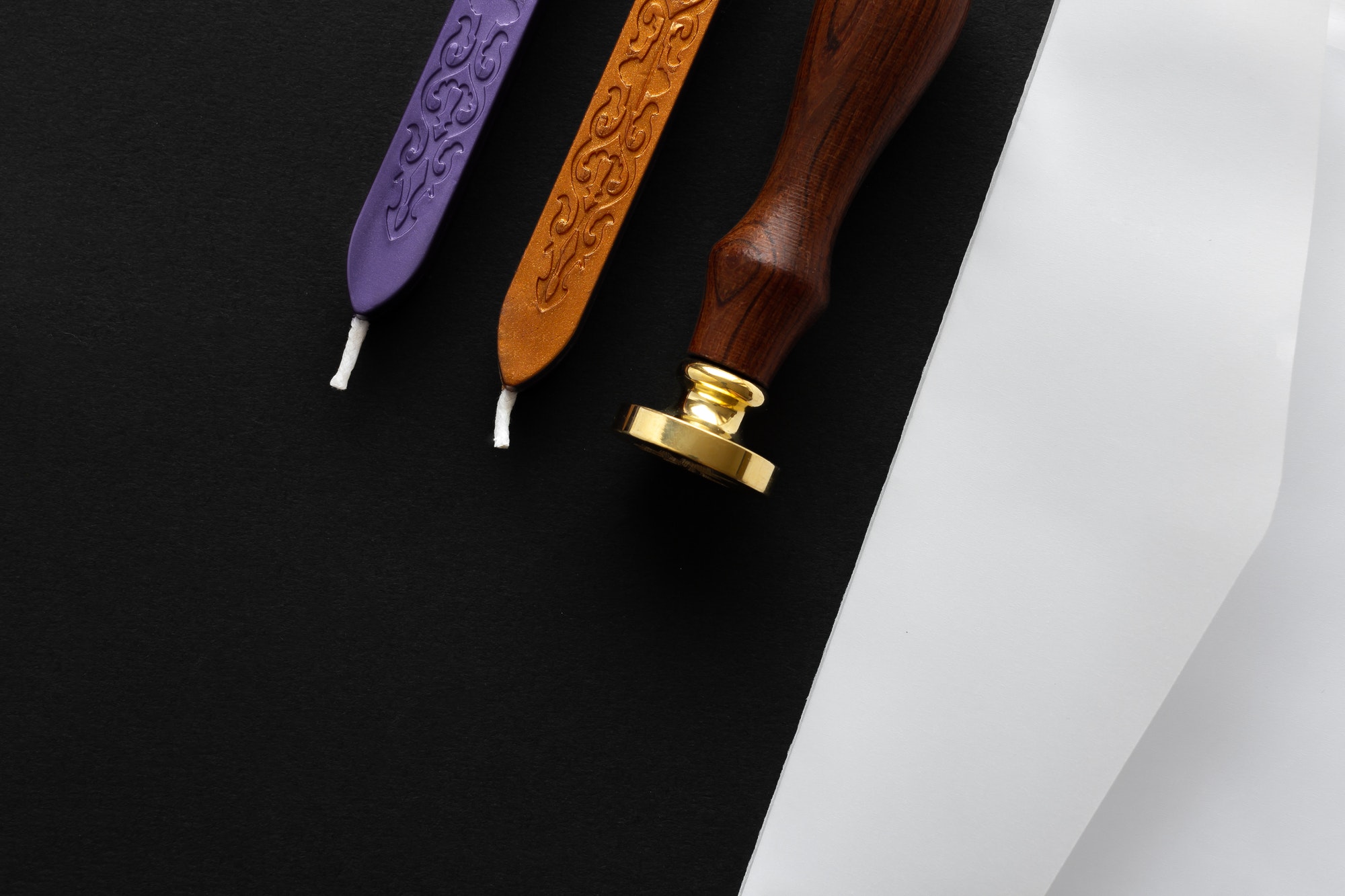 Notary public wax stamper. White envelope with brown wax seal, golden stamp. Responsive design