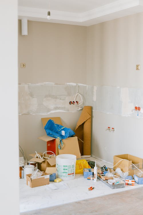 The Eviction Process Explained: A Guide for Landlords and Tenants Free A room in the midst of home renovation with tools and supplies scattered around. Stock Photo
