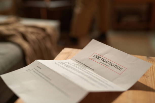 The Eviction Process Explained: A Guide for Landlords and Tenants Room Eviction Notice Placed On Wooden Desk
